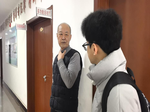 图19 咨询炕围画传承人.png